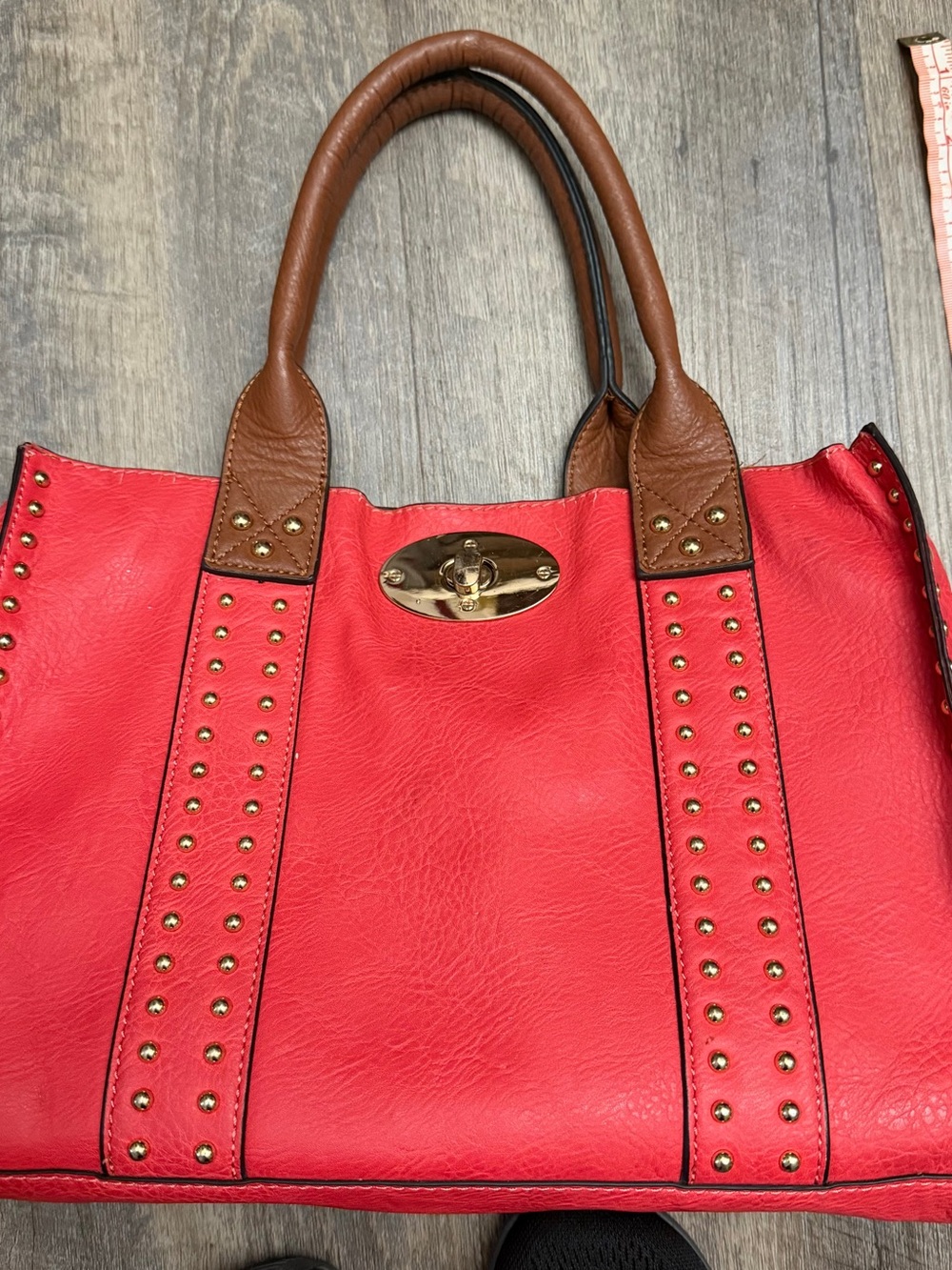 Black Rivet Red Tote with Brown Handles and Gold Hardware